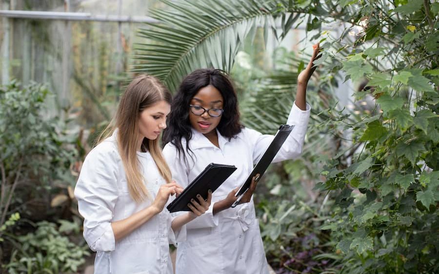 women-agricultural-engineers-standing-in-front-2023-11-27-04-53-17-utc